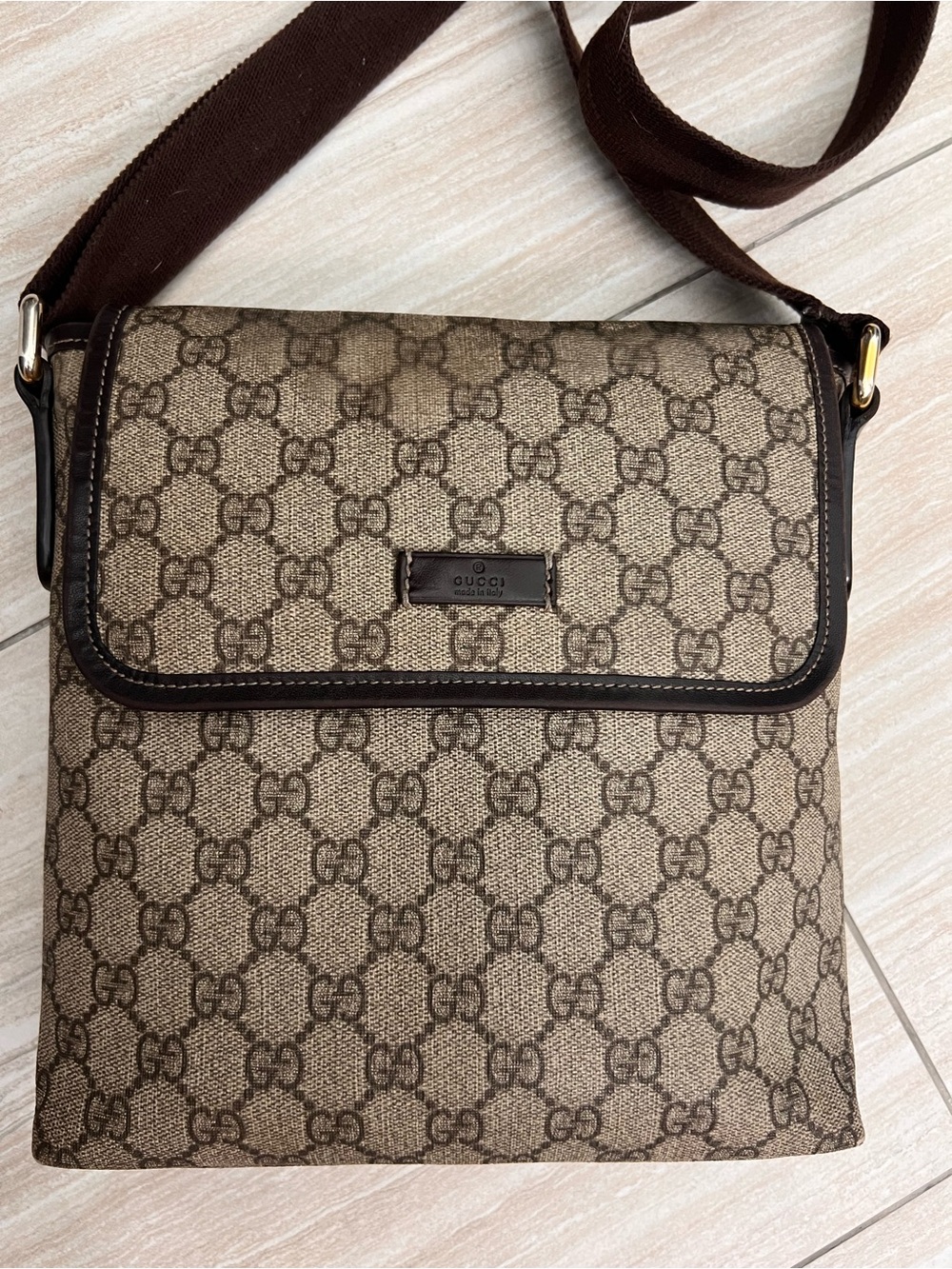 Gucci canvas messenger bag.